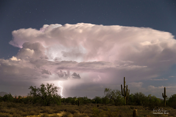 Arizona monsoon cloud with lightning striking the beautiful Sonoran desert in North Scottsdale.